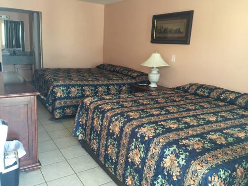 Imagen de la habitación del Hotel Seaside Sands Inn. Foto 13