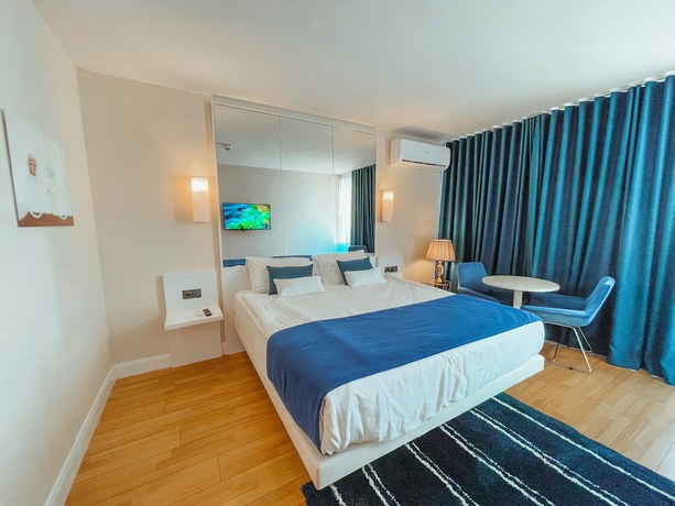 Imagen de la habitación del Hotel Seaside VIP40. Foto 12