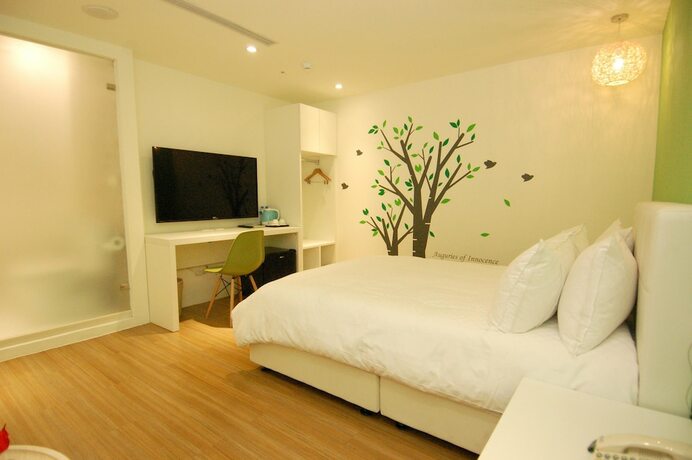 Imagen de la habitación del Hotel Season 5 Inn. Foto 15