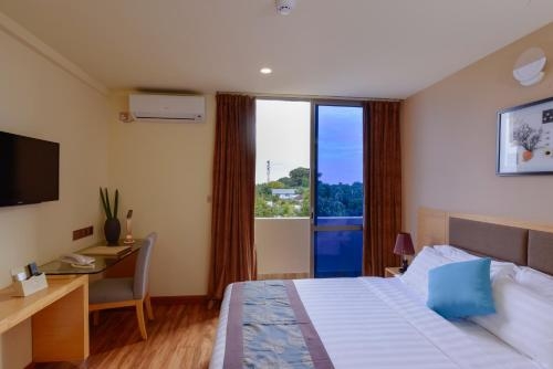 Imagen de la habitación del Hotel Season Paradise. Foto 6