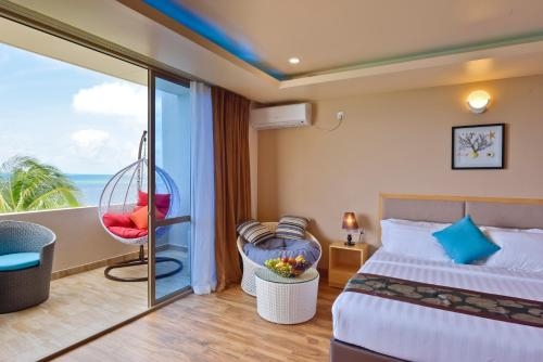 Imagen de la habitación del Hotel Season Paradise. Foto 8