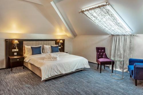 Imagen de la habitación del Hotel Seasons Boutique. Foto 6