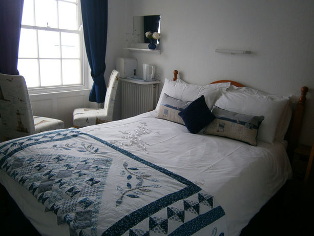 Imagen de la habitación del Hotel Seasons Guest House. Foto 7