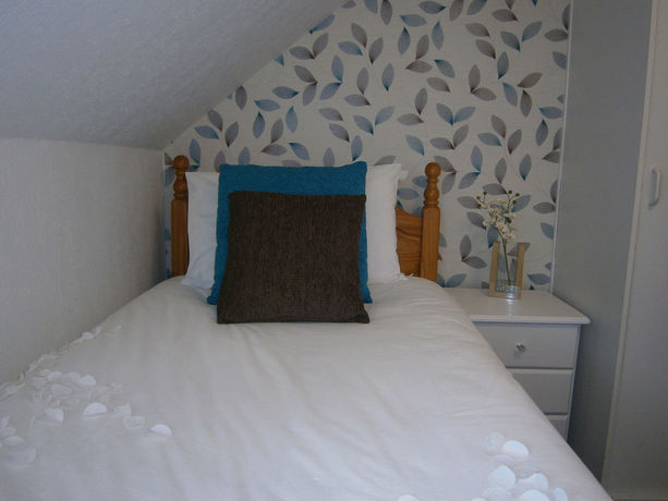 Imagen de la habitación del Hotel Seasons Guest House. Foto 10
