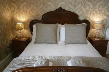 Imagen de la habitación del Hotel Seasons Guest House. Foto 12