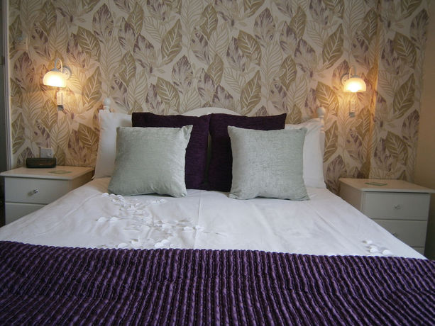 Imagen de la habitación del Hotel Seasons Guest House. Foto 15