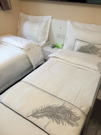 Imagen de la habitación del Hotel Seasons Hotel - Causeway Bay. Foto 5