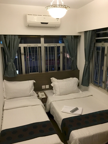 Imagen de la habitación del Hotel Seasons Hotel - Causeway Bay. Foto 6