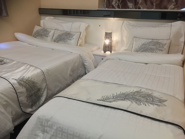 Imagen de la habitación del Hotel Seasons Hotel - Causeway Bay. Foto 10