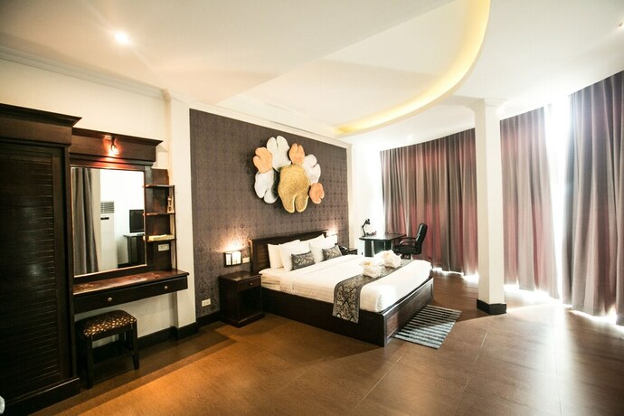 Imagen de la habitación del Hotel Seasons Riverside. Foto 20