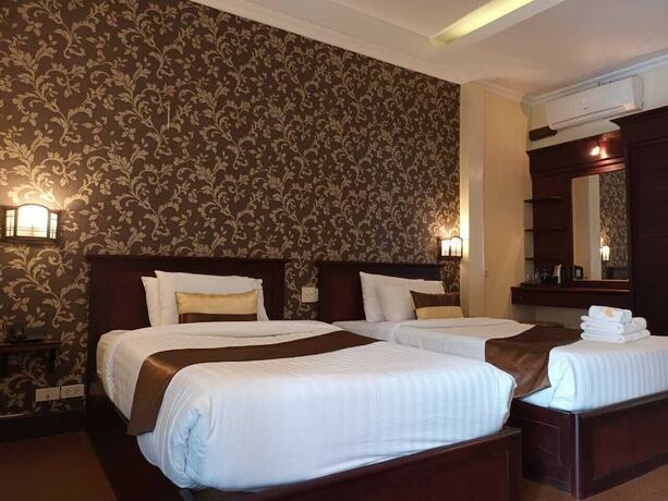 Imagen de la habitación del Hotel Seasons Riverside. Foto 25