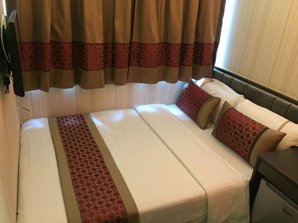 Imagen de la habitación del Hotel Seasons - Tsim sha tsui. Foto 2