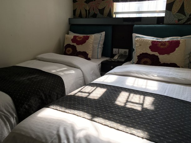 Imagen de la habitación del Hotel Seasons - Tsim sha tsui. Foto 4
