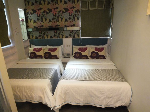 Imagen de la habitación del Hotel Seasons - Tsim sha tsui. Foto 13