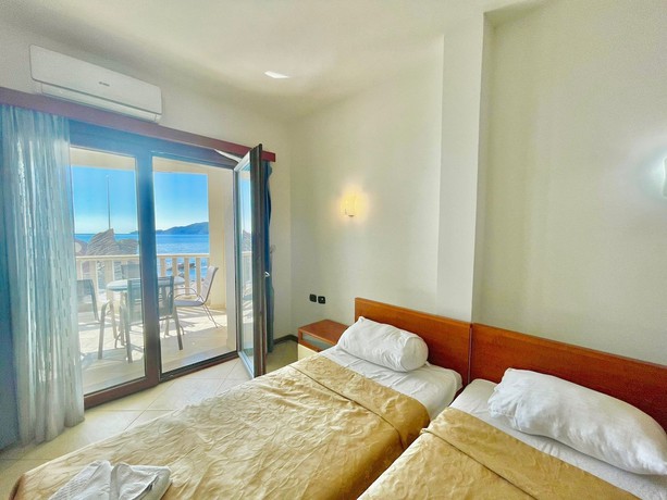 Imagen de la habitación del Hotel Seaview Apartments Rafailovici. Foto 8
