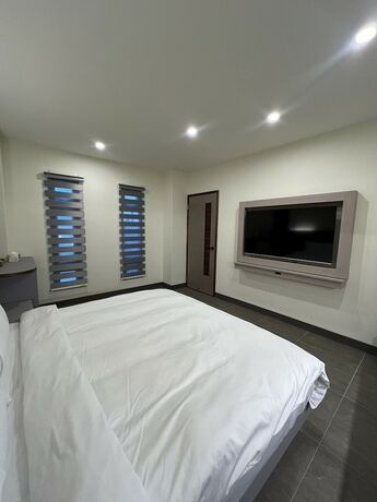 Imagen de la habitación del Hotel Seaview Villa Coastal Estate. Foto 11