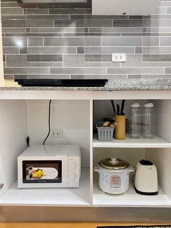 Imagen de la habitación del Hotel Seawind Condo 2BR Near Samal and Airport. Foto 7