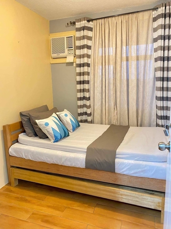 Imagen de la habitación del Hotel Seawind Condo 2BR Near Samal and Airport. Foto 19