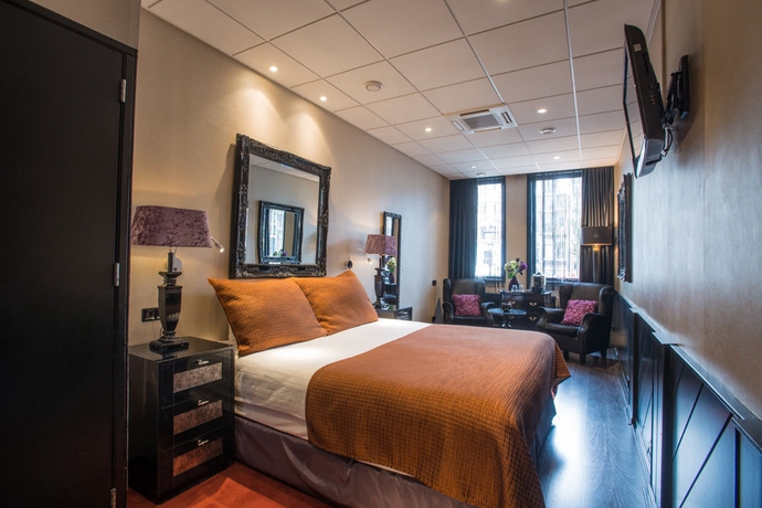 Imagen de la habitación del Hotel Sebastian's. Foto 12