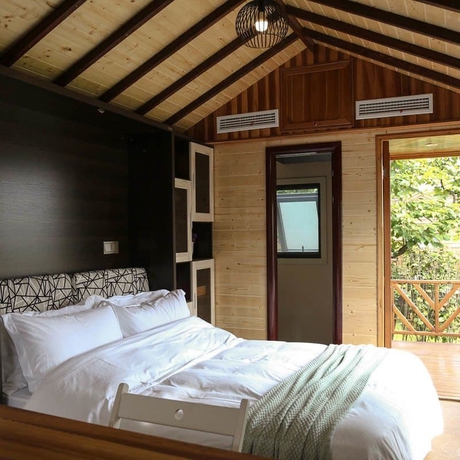 Imagen de la habitación del Hotel Seclusion Scenery Of Shangshui International Rv Resort. Foto 4
