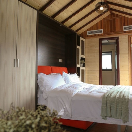 Imagen de la habitación del Hotel Seclusion Scenery Of Shangshui International Rv Resort. Foto 6