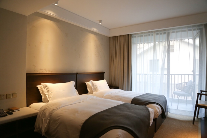 Imagen de la habitación del Hotel Seclusive Life In Jiangnan &bull;canal Yard. Foto 8