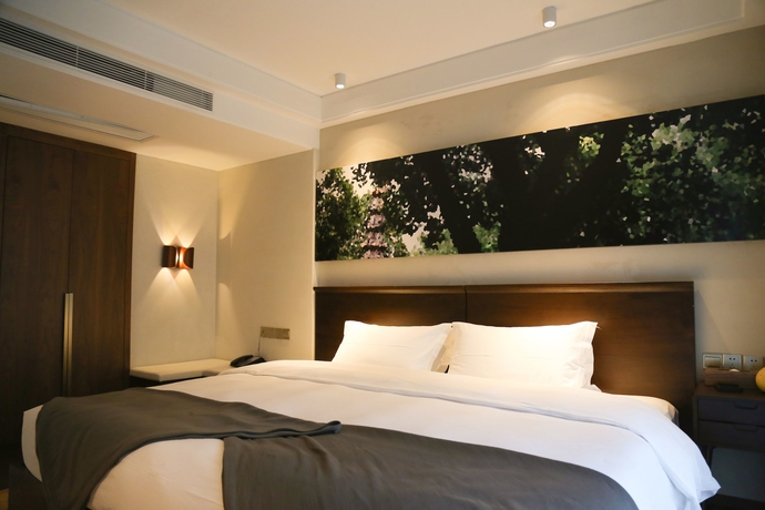Imagen de la habitación del Hotel Seclusive Life In Jiangnan &bull;canal Yard. Foto 11