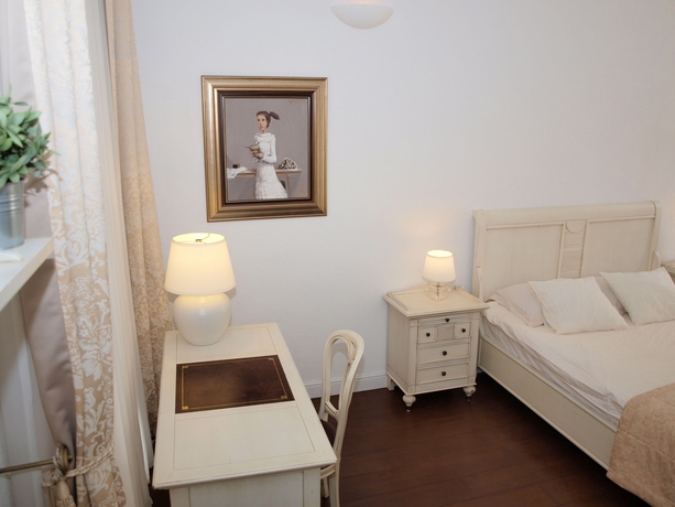 Imagen de la habitación del Hotel Secret Apartments. Foto 12