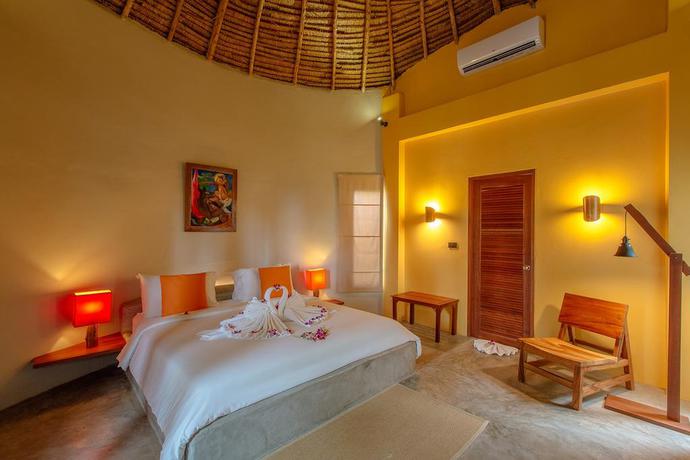 Imagen de la habitación del Hotel Secret Garden Beach Resort. Foto 4