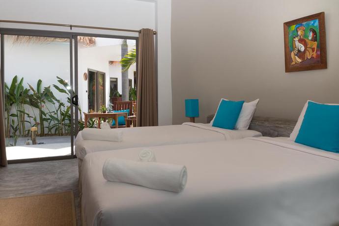 Imagen de la habitación del Hotel Secret Garden Beach Resort. Foto 5