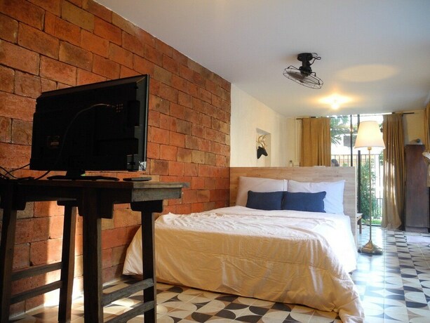Imagen de la habitación del Hotel Secret Garden Pool Villa. Foto 24