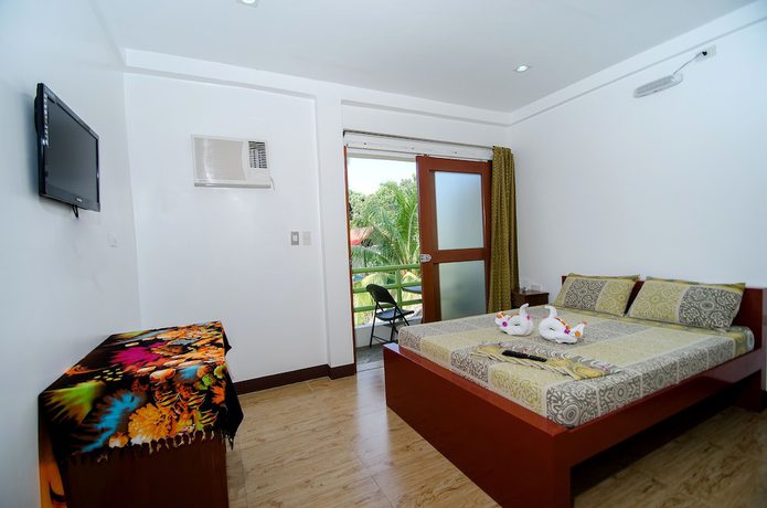 Imagen de la habitación del Hotel Secret Garden Resort. Foto 7