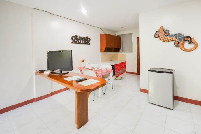 Imagen de la habitación del Hotel Secret Garden Resort. Foto 17