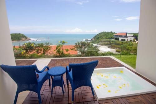 Imagen de la habitación del Hotel Secrets Huatulco Resort and Spa - Adults Only - All Inclusive. Foto 9