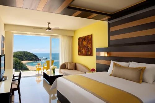 Imagen de la habitación del Hotel Secrets Huatulco Resort and Spa - Adults Only - All Inclusive. Foto 13