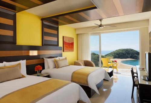 Imagen de la habitación del Hotel Secrets Huatulco Resort and Spa - Adults Only - All Inclusive. Foto 16