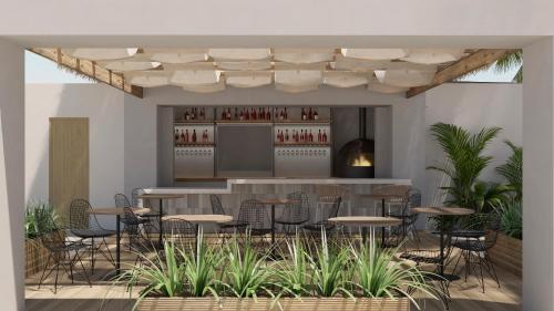 Imagen del bar/restaurante del Hotel Secrets Playa Esmeralda Resort & Spa. Foto 7