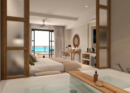 Imagen de la habitación del Hotel Secrets Playa Esmeralda Resort & Spa. Foto 12