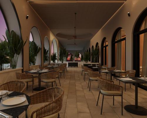 Imagen del bar/restaurante del Hotel Secrets Playa Esmeralda Resort & Spa. Foto 8