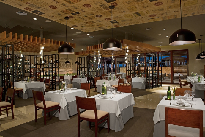 Imagen del bar/restaurante del Hotel Secrets Playa Mujeres Golf and Spa Resort - Adults Only - All Inclusive. Foto 3