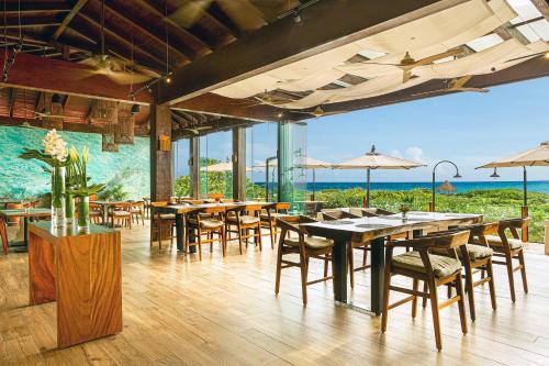 Imagen del bar/restaurante del Hotel Secrets Playa Mujeres Golf and Spa Resort - Adults Only - All Inclusive. Foto 8