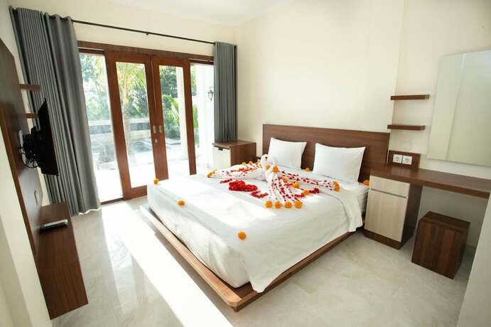 Imagen de la habitación del Hotel Sedana Cottage. Foto 19
