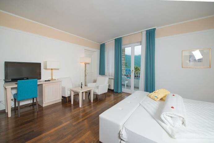 Imagen de la habitación del Hotel Seegarten, St. Josef am See - San Giuseppe al Lago. Foto 19