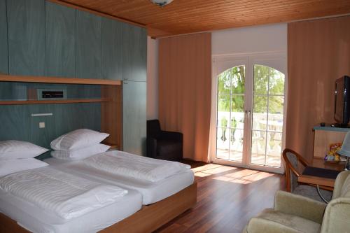 Imagen de la habitación del Hotel Seehotel Herlinde. Foto 8