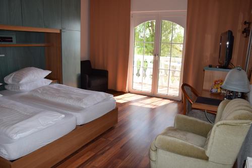 Imagen de la habitación del Hotel Seehotel Herlinde. Foto 10