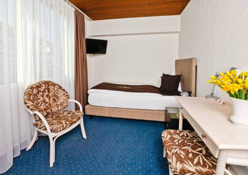 Imagen de la habitación del Hotel Seehotel Pilatus. Foto 5