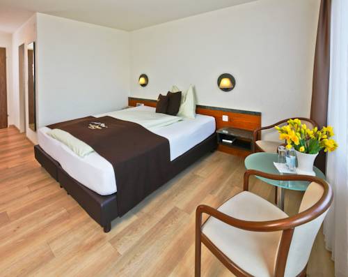 Imagen de la habitación del Hotel Seehotel Pilatus. Foto 10