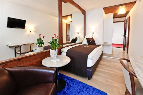 Imagen de la habitación del Hotel Seehotel Pilatus. Foto 12