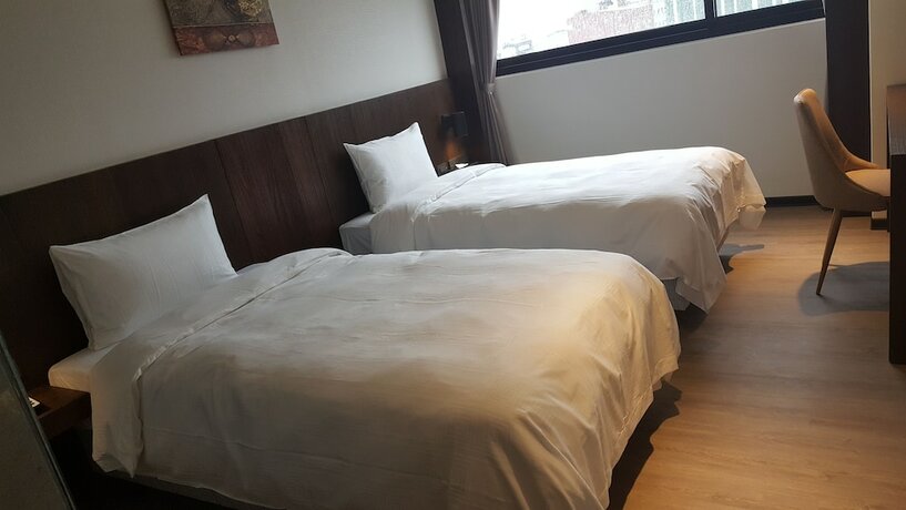 Imagen de la habitación del Hotel Seeing Inn. Foto 25