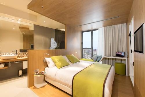 Imagen de la habitación del Hotel Seen Abidjan Plateau. Foto 8